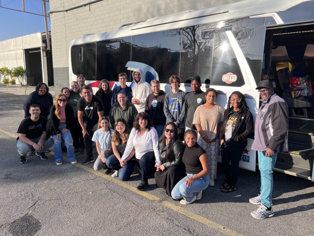 God's provision: his chosen people for this short-term mission trip, posing outside the team bus.