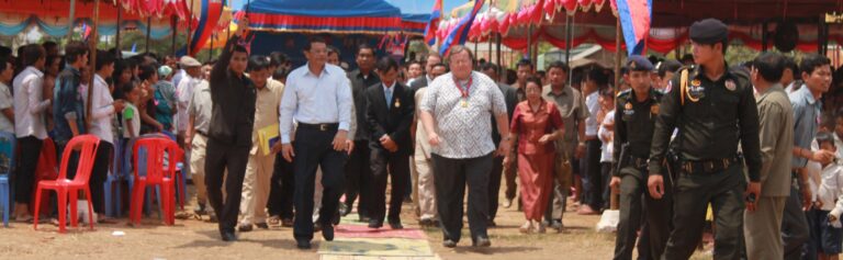 Deputy PM and Ps Mark walking side-by-side to celebrate the Rongko Cluster Schools